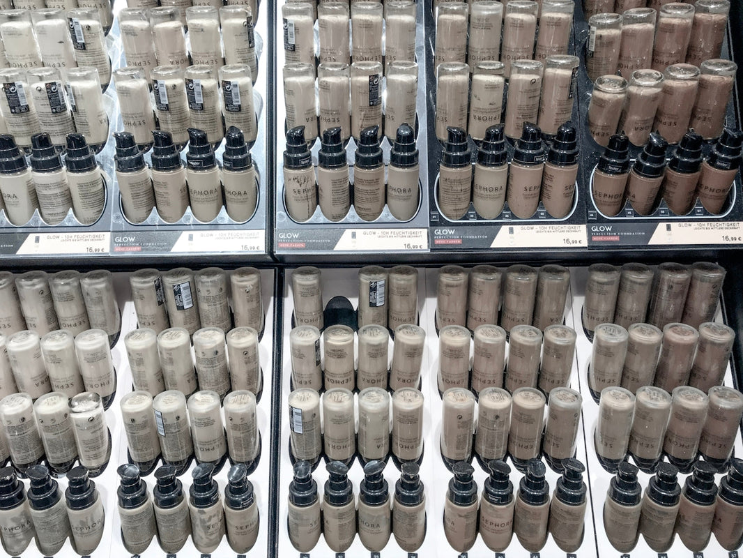 a display case filled with lots of brown and black items