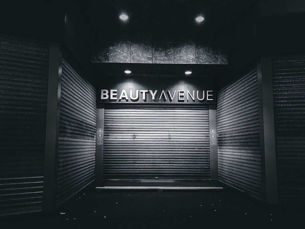 a black and white photo of a closed storage unit