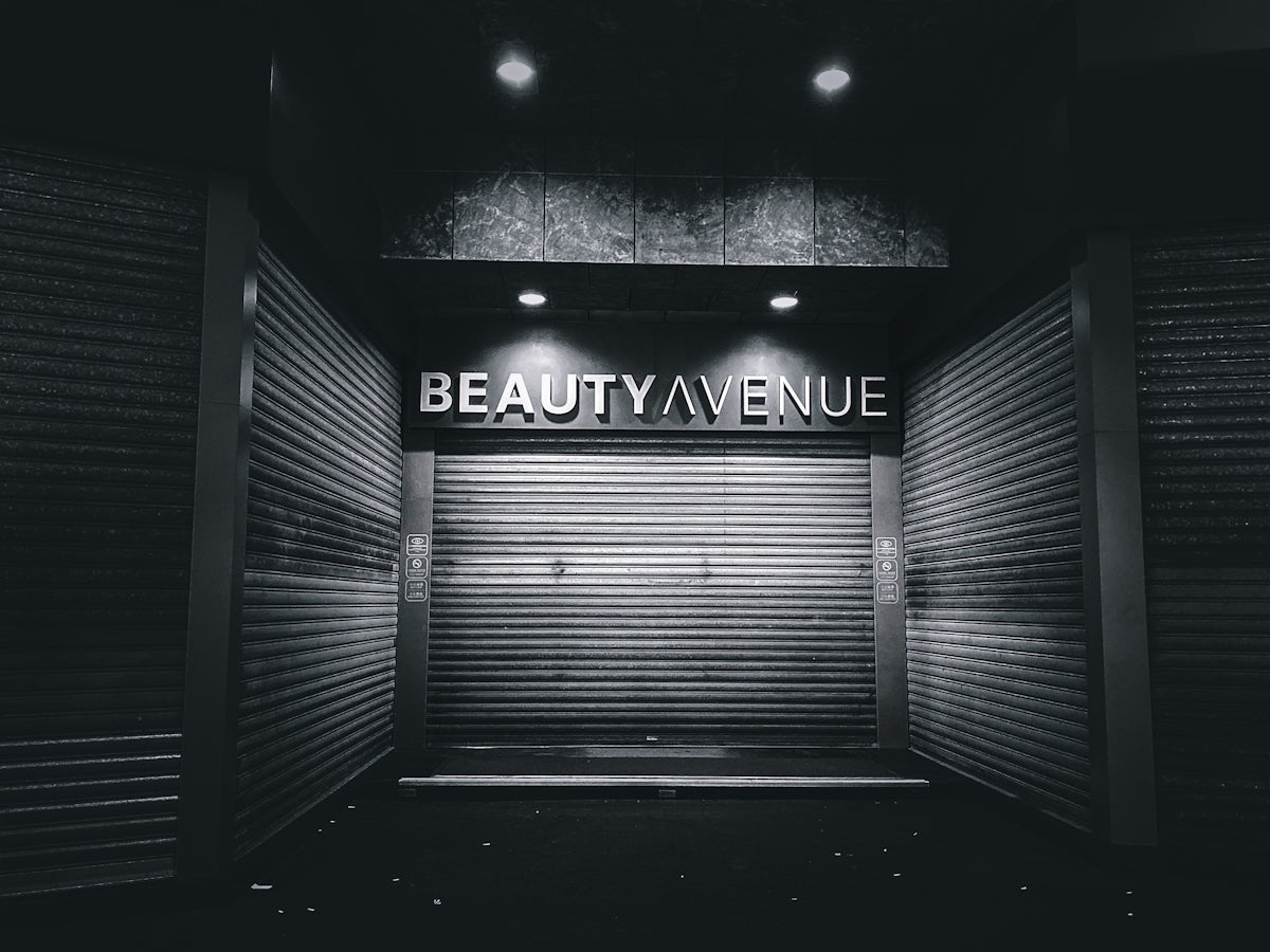 a black and white photo of a closed storage unit