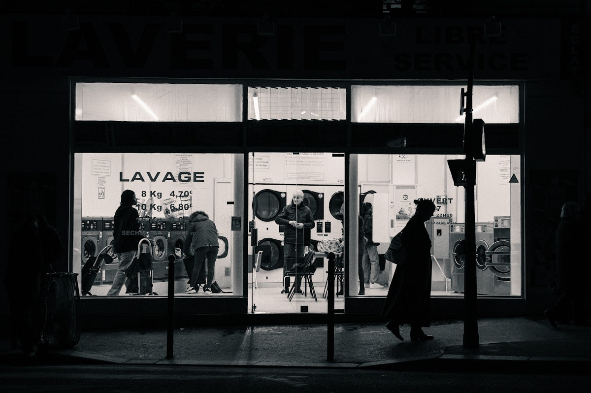 a black and white photo of a store front