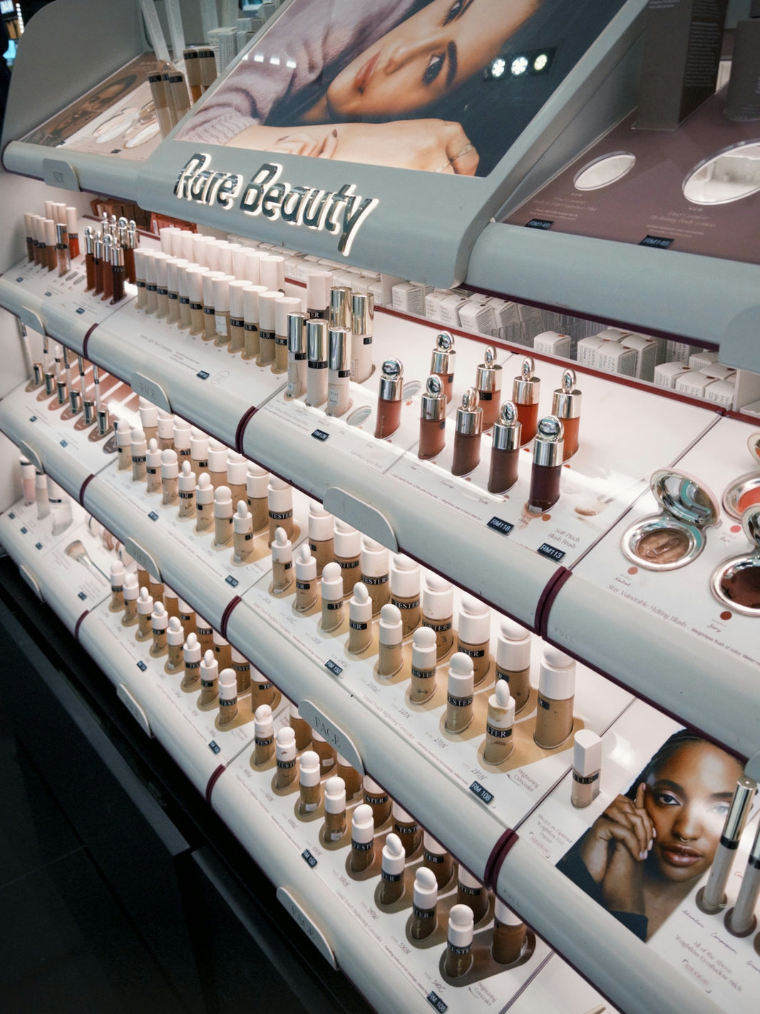 a display of various beauty products on a shelf