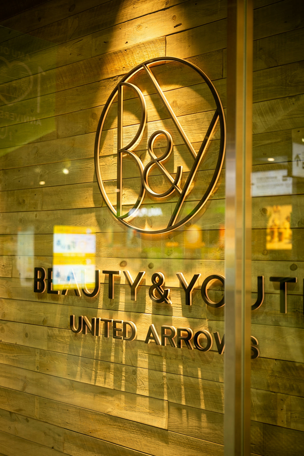 The image shows a beauty & youth store sign.