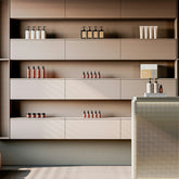 Shelves with skincare products and bottles in a salon