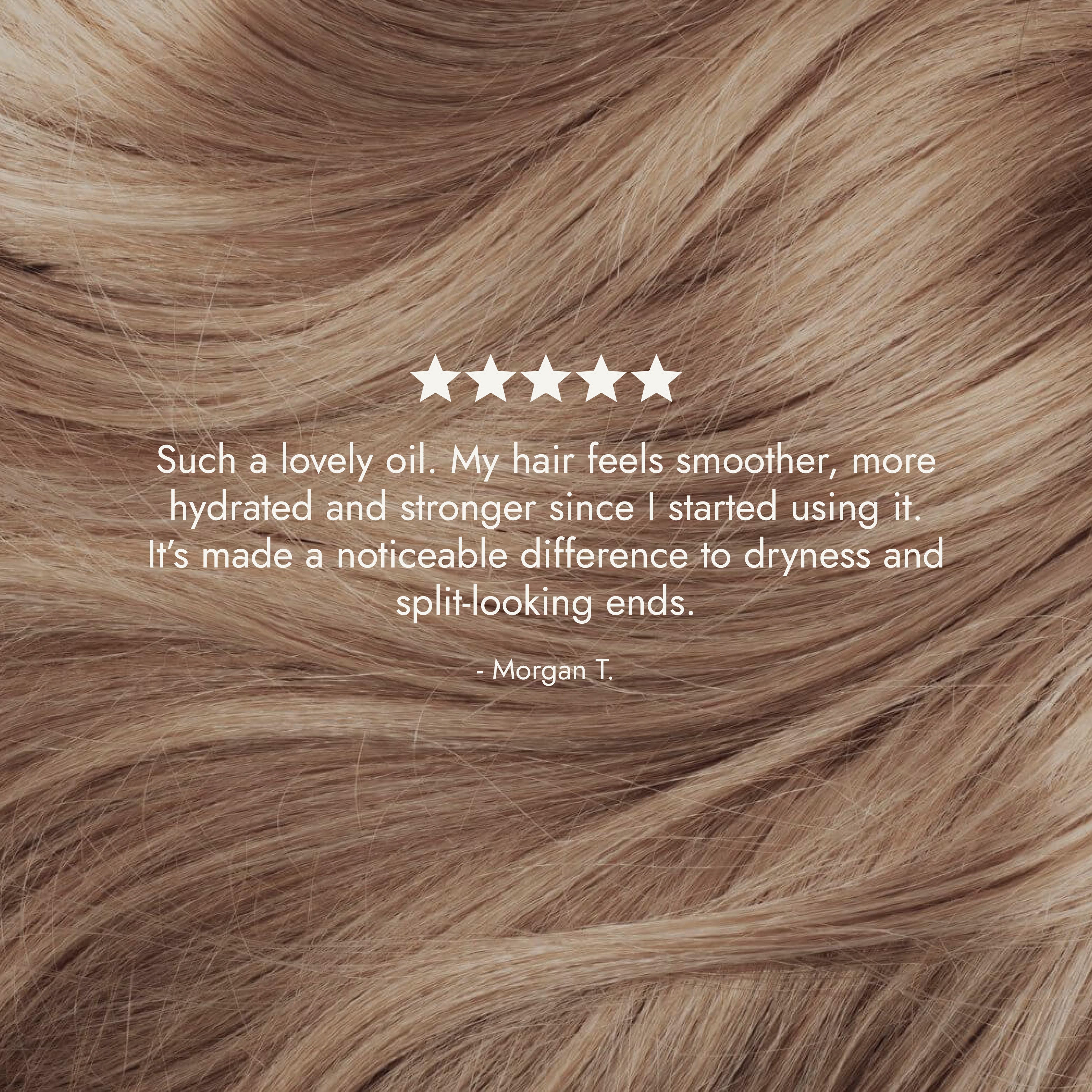Rosemary hair oil bottle with dropper on a stone surface with natural light. Rosemary hair oil, argan, almond, bond, boost, hair growth, coconut oil, healthier, fuller-looking hair, stimulate, regrowth, hair thinning, natural, 100ml, review, 5 star