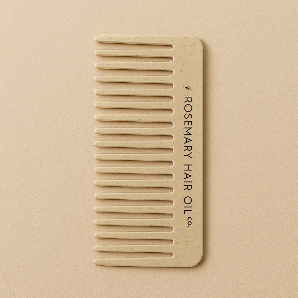 Beige comb with 'Rosemary Hair Oil Co.' branding on a beige background, wide tooth flat comb, 